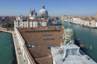 Drone footage of the Dogana da Mar, moving wind vane of Saint Fortuna on a gilded globe carried by