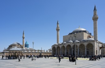 Large square in front of a mosque with people in a quiet atmosphere, Mevlana Museum, Mevlana,