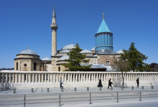 Grand mosque with minaret and religious architecture under clear skies, Mevlana Museum, Mevlana,