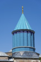 Detail of a turquoise dome in Islamic architecture under a blue sky, Mevlana Museum, Mevlana,