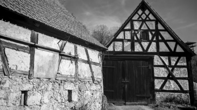 Old half-timbered buildings shot in black and white, Franconian Switzerland