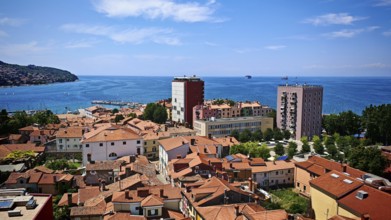 Panorama of a coastal town with red roofs and sea horizon, Koper, Slovenia
