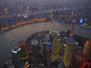 Impressive skyline of an illuminated city at dusk, Shanghai, China
