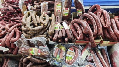 Different types of sausages offered for sale at a market, Skopje, North Macedonia