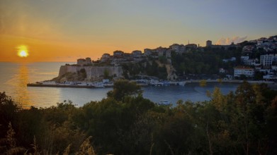 Sunset over the coast with historic buildings and sea view, Ulcinj, Montenegro