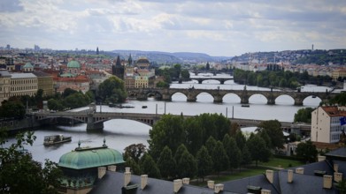 Panorama of a city with rivers, bridges and historic cityscape, view of Charles Bridge, Prague,