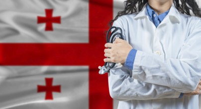 Healthcare professional with Georgia flag background. Professional doctor holding stethoscope on