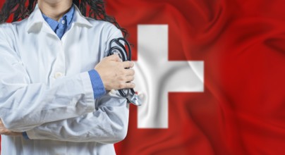 Healthcare professional with Switzerland flag background. Professional doctor holding stethoscope