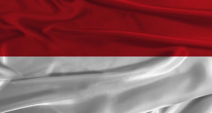 Flag of Monaco with fabric textured background. Close up of National flag of Monaco with realistic