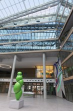 EUREF-Campus Düsseldorf, atrium with sculpture Blow up by Stephan Marienfeld, European Energy Forum