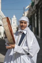 Tripoli, Libya, North Africa. A young man in traditional clothes in the historic quarter with
