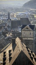 View of a wintry town with distinctive roofs and church tower, view of Kronach, Frankenwald nature