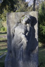 Grave sculpture hand holding female figure, Willy Schlatter Historical Tomb, North Cemetery