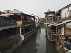 Rustic canal view with cozy decorated cafes and a sense of serenity, Zhujiajiao Ancient Town,