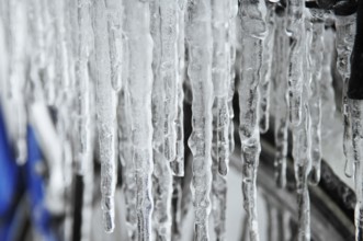 Bicycle icy due to freezing rain, icicles, detailed view