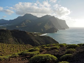 Coastal landscape with mountains and sea in soft light of evening sun, Puerto de la Aldea, Gran