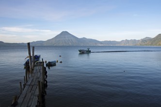 Boats on the pier, Lake Atitlán or Lake Atitlán in the morning, at the back of the San Pedro