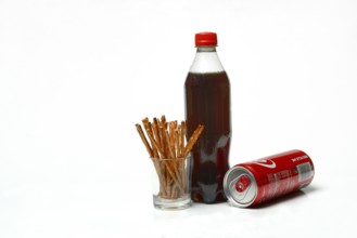 Pretzel sticks and cola