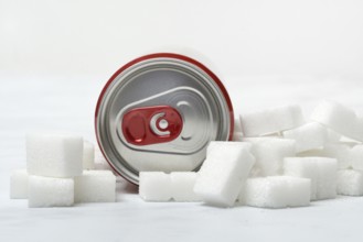 Cola can and lots of sugar cubes