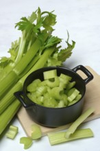 Celery stalks, pieces in pots