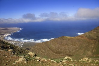 Panoramic view of the coast from Mirador de Ermita de Las Nieves with moving sea and slightly