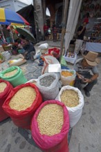 Different colored corn in bags for sale at the market in Chichicastenango, Highlands, El Quiché