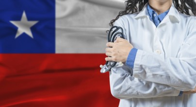 Healthcare professional with Chile flag background. Professional doctor holding stethoscope on