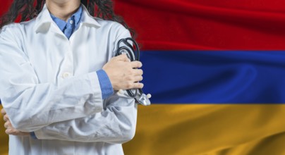 Healthcare professional with Armenia flag background. Professional doctor holding stethoscope on