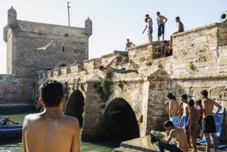 Children playing on the promenade, Essaouira, UNESCO World Heritage Site, Atlantic coast, Morocco