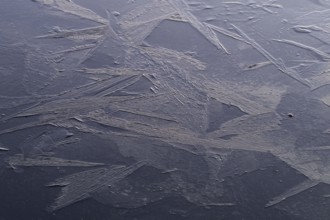 Crystal-like ice structures, frozen lake, Finland