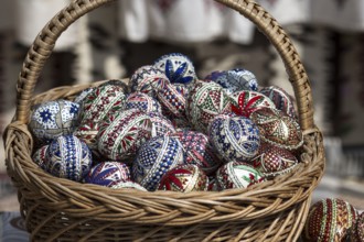 Colourfully painted eggs as a souvenir in front of Voronet Monastery, Buckovina, Romania
