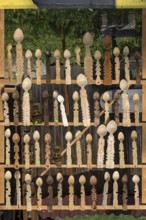 Carved wooden spoons as a souvenir in front of Voronet Monastery, Buckovina, Romania