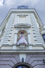Mannequin in Ukrainian traditional costume in a niche at a 19th-century house, Czernowicz, Ukraine
