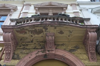Dilapidated balcony of a 19th-century house, Czernowicz, Ukraine