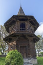 Wooden bell tower near the Church of the Exaltation of the Cross, Patrauti Moldavian monastery from