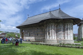 Tour group in front of Humor Monastery, Romanian Orthodox Women's Monastery, 1530, Gura Humorului,