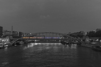 Night-time subway across the Viaduc d'Austerlitz, across the Seine, black and white, Paris, France