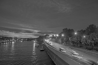 View of the Seine at night, the towers of Notre Dame in black and white, Paris, France