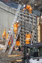 Construction work on a concrete retaining wall at the Duisburg-Kaiserberg motorway junction, on the