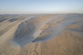 White sand dunes in the Khaluf Desert, Oman