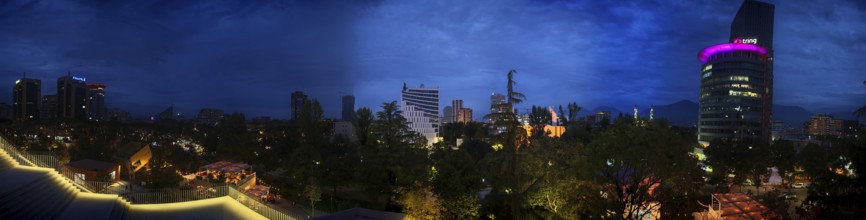 Panoramic view of an illuminated skyline at night with skyscrapers and lights, Tirana, Albania