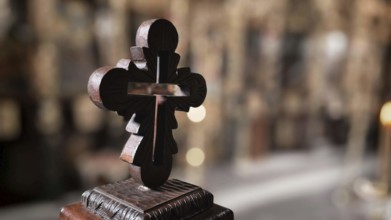 Close-up of an artfully designed wooden cross against a blurred background, North Macedonia