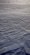 Detailed wave patterns in the sand