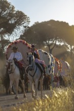 Donana National Park, Almonte, Huelva, Spain. A couple in traditional equestrian clothes during the