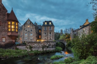 Dean Village, Edinburgh, Scotland, UK. Traditional houses and church with canal in historic Dean