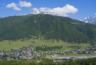 Village in an extensive, green hilly landscape with mountain scenery, Mestia, Mingrelia and Upper