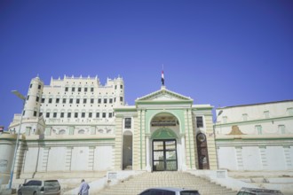 In Seiyun, Yemen, on January 15, 2026, the national flag of Yemen flies over a government building