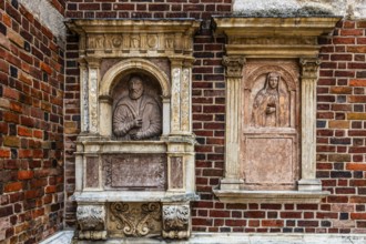 Stone epitaph at St Barbara's Church for the pharmacist and city councillor Jerzy Pipan (died 1566)