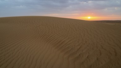 Sunset, sand dunes in the Wahiba Sands desert, Oman