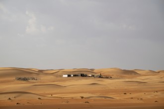 Bedouin camp in the sand dunes in the Wahiba Sands desert, Oman
